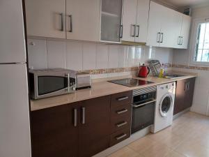 As017 Castillo 3-Bedroom San Juan de Los Terrerosにあるキッチンまたは簡易キッチン +11枚の写真