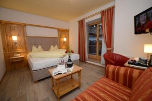Posteľ alebo postele v izbe v ubytovaní Hotel Zimmerbräu