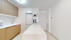 Kuchyňa alebo kuchynka v ubytovaní Apartamento Bianca Beach