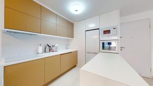 Kuchyňa alebo kuchynka v ubytovaní Apartamento Bianca Beach