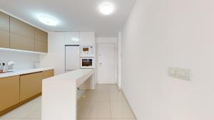 Kuchyňa alebo kuchynka v ubytovaní Apartamento Bianca Beach