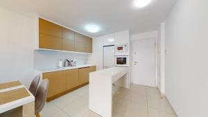 Kuchyňa alebo kuchynka v ubytovaní Apartamento Bianca Beach