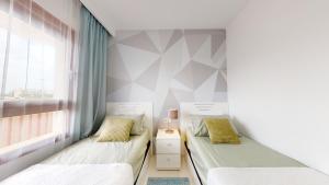 Posteľ alebo postele v izbe v ubytovaní Apartamento Bianca Beach + 37 fotografií