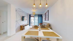 Posedenie v ubytovaní Apartamento Bianca Beach