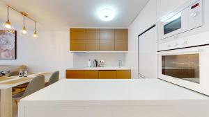 Kuchyňa alebo kuchynka v ubytovaní Apartamento Bianca Beach