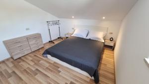 Katil atau katil-katil dalam bilik di Apartment Olive +6 gambar