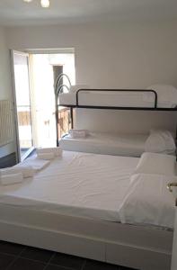 Кровать или кровати в номере Appartamento - Il Rustico