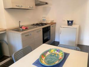 Küche/Küchenzeile in der Unterkunft Appartamento - Il Rustico