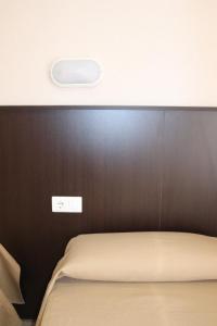 Postel nebo postele na pokoji v ubytování Hotel Fin De Semana