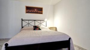 Postel nebo postele na pokoji v ubytování Quadrilatero, spaziosa, easy, Ca' dei viaggiatori