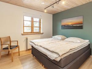 Postel nebo postele na pokoji v ubytování 10 person holiday home in Skagen