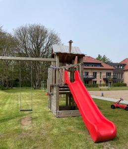 Herní místnost nebo prostor pro děti v ubytování Wohnen am Südstrand - Ferienwohnung 1 3