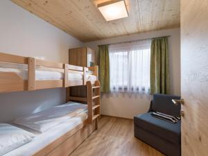 Letto o letti in una camera di Hotel Baumgarten & Chalet Baumgarten