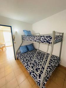 Katil atau katil-katil dalam bilik di Appartement Sainte Marie la mer 66470