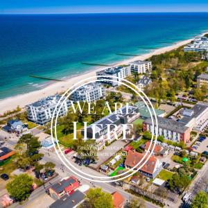 an aerial view of a city with the words we are hiring at Great Polonia Sand Beach Mielno in Mielno