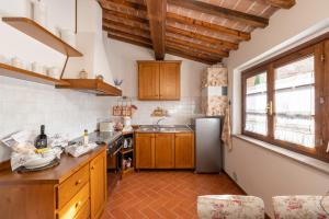 Kuchyň nebo kuchyňský kout v ubytování Lajatico Rentals - Casa di Alice nel Borgo