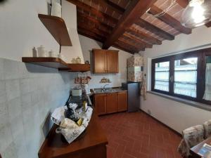 Kuchyň nebo kuchyňský kout v ubytování Lajatico Rentals - Casa di Alice nel Borgo