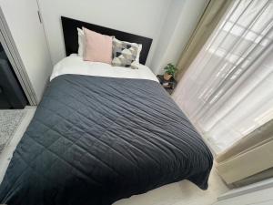 Apartment Namba Style VR 객실 침대