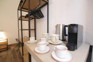 Příslušenství pro přípravu čaje a kávy v ubytování Antica Residenza Fusco