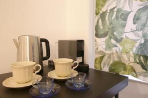 Příslušenství pro přípravu čaje a kávy v ubytování Antica Residenza Fusco