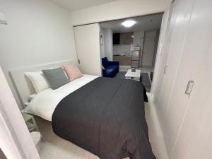 Apartment Namba Style VR 객실 침대