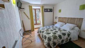 Posteľ alebo postele v izbe v ubytovaní Chambres d'hôtes Les Lits des Fées