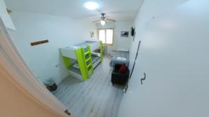 an overhead view of a bedroom with a bunk bed at Pensión Pamplonabeds in Pamplona