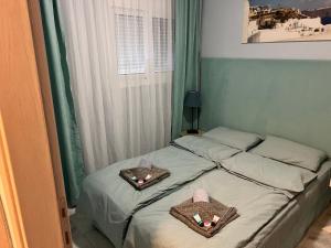 Postel nebo postele na pokoji v ubytování Къща за Гости в Созополи