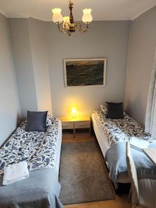 Llit o llits en una habitació de Guesthouse Kiljan
