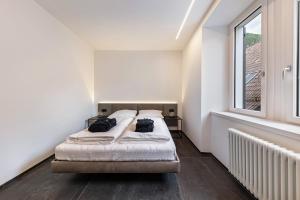 Posteľ alebo postele v izbe v ubytovaní App 205 Palazzo Cavour