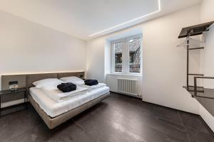Posteľ alebo postele v izbe v ubytovaní App 205 Palazzo Cavour