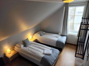 Llit o llits en una habitació de Guesthouse Kiljan
