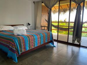 Letto o letti in una camera di Hosteria Guachapeli
