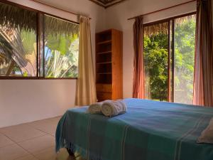 Letto o letti in una camera di Hosteria Guachapeli