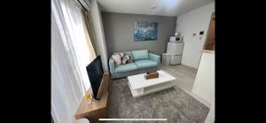 Apartment Namba Style VR 객실 침대