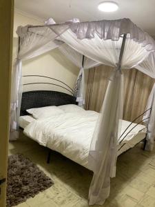 Postel nebo postele na pokoji v ubytování Eve Homestay