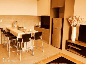 A kitchen or kitchenette at BS828- KLIA- WIFI- NETFLIX- PARKING-NEW- BELL SUITES- Sepang, 5068