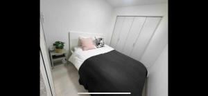 Apartment Namba Style VR 객실 침대