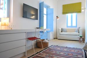 TV a/nebo společenská místnost v ubytování Residence van Krienen