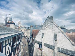 a view of a city street with buildings and a sky at Le studio L'anodin - centre rive droite - 227 in Rouen