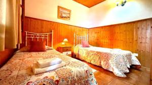 Łóżko lub łóżka w pokoju w obiekcie Casa Rural Ondina