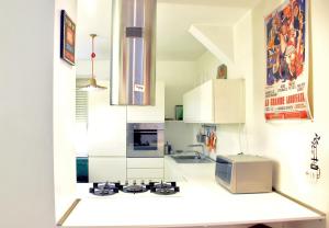 Kuchyň nebo kuchyňský kout v ubytování San Marzano Apartment