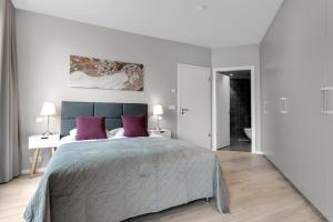 Postel nebo postele na pokoji v ubytování Tower Apartments