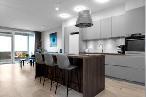 Kuchyň nebo kuchyňský kout v ubytování Tower Apartments