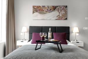 Postel nebo postele na pokoji v ubytování Tower Apartments