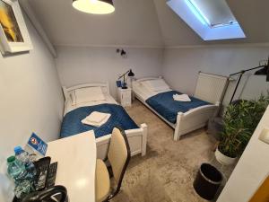Posteľ alebo postele v izbe v ubytovaní Hotel Staropolska