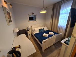 Posteľ alebo postele v izbe v ubytovaní Hotel Staropolska