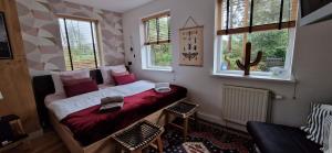 Postel nebo postele na pokoji v ubytování B&B Duinbrink