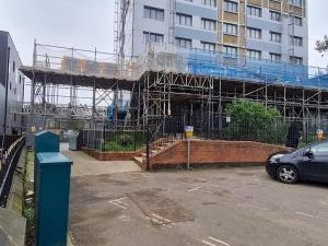 un edificio in costruzione in un parcheggio di Pass the Keys Central One bed apartment a Nottingham