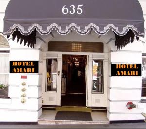 a hotel entrance with a hotel await sign on the front at Hotel Amari in San Francisco